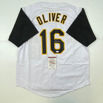 White custom jersey from professional sports league with OLIVER 16 autograph