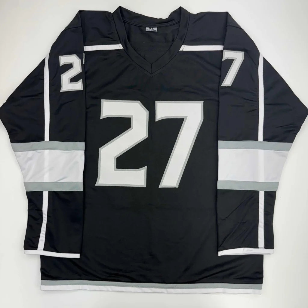 Black hockey jersey with white gray stripes and 27 number, perfect for professional sports fans