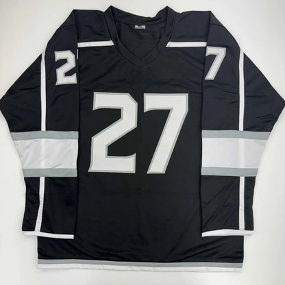 Black hockey jersey with white gray stripes and 27 number, perfect for professional sports fans