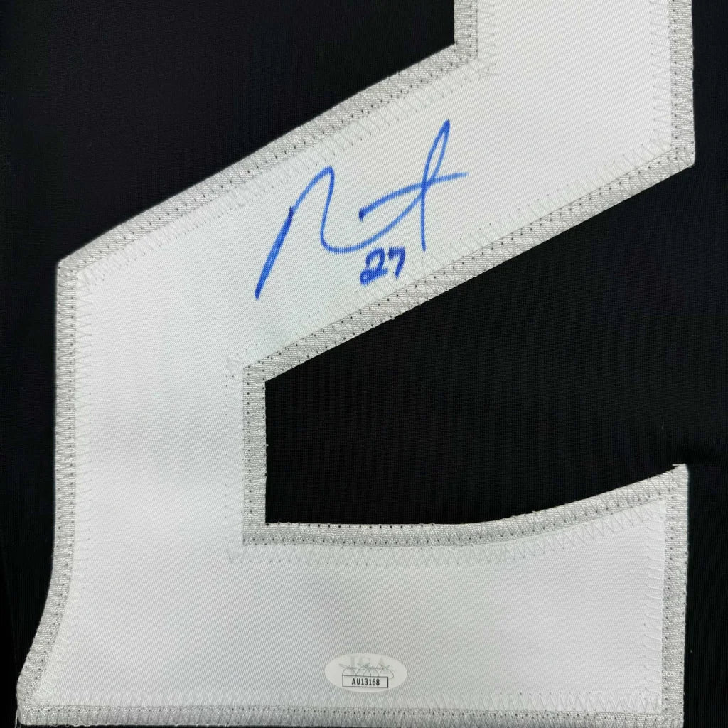 Signed white custom jersey number 27 from a professional sports league collectible