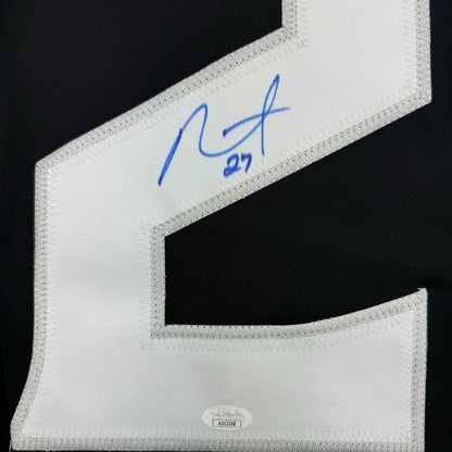 Signed white custom jersey number 27 from a professional sports league collectible