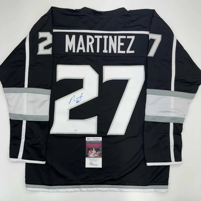 Autographed Alec Martinez Los Angeles LA Black Hockey Jersey JSA COA | Hall of Fame Sports Memorabilia | vintageantiquesgifts.com