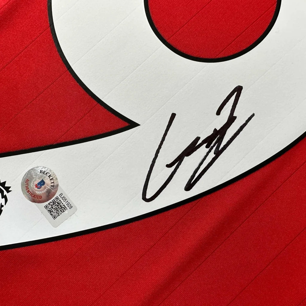 Red Manchester United Garnacho signed sports jersey with white number and black autograph