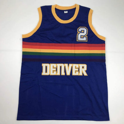Blue custom jersey with colorful stripes and gold number 2 from a professional sports league