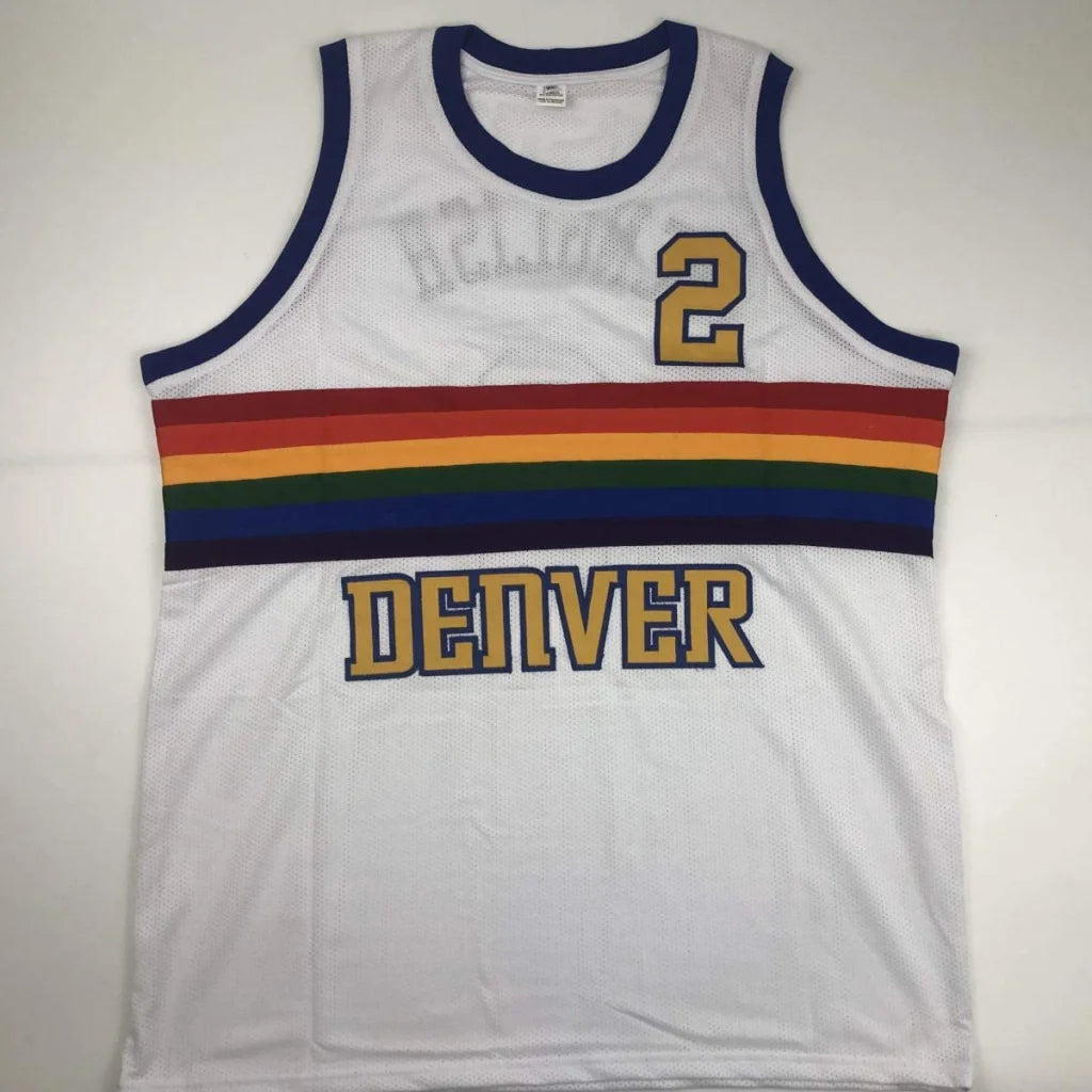 Autographed alex english white mesh basketball jersey with navy trim rainbow stripe and gold denver lettering professional sports custom jersey