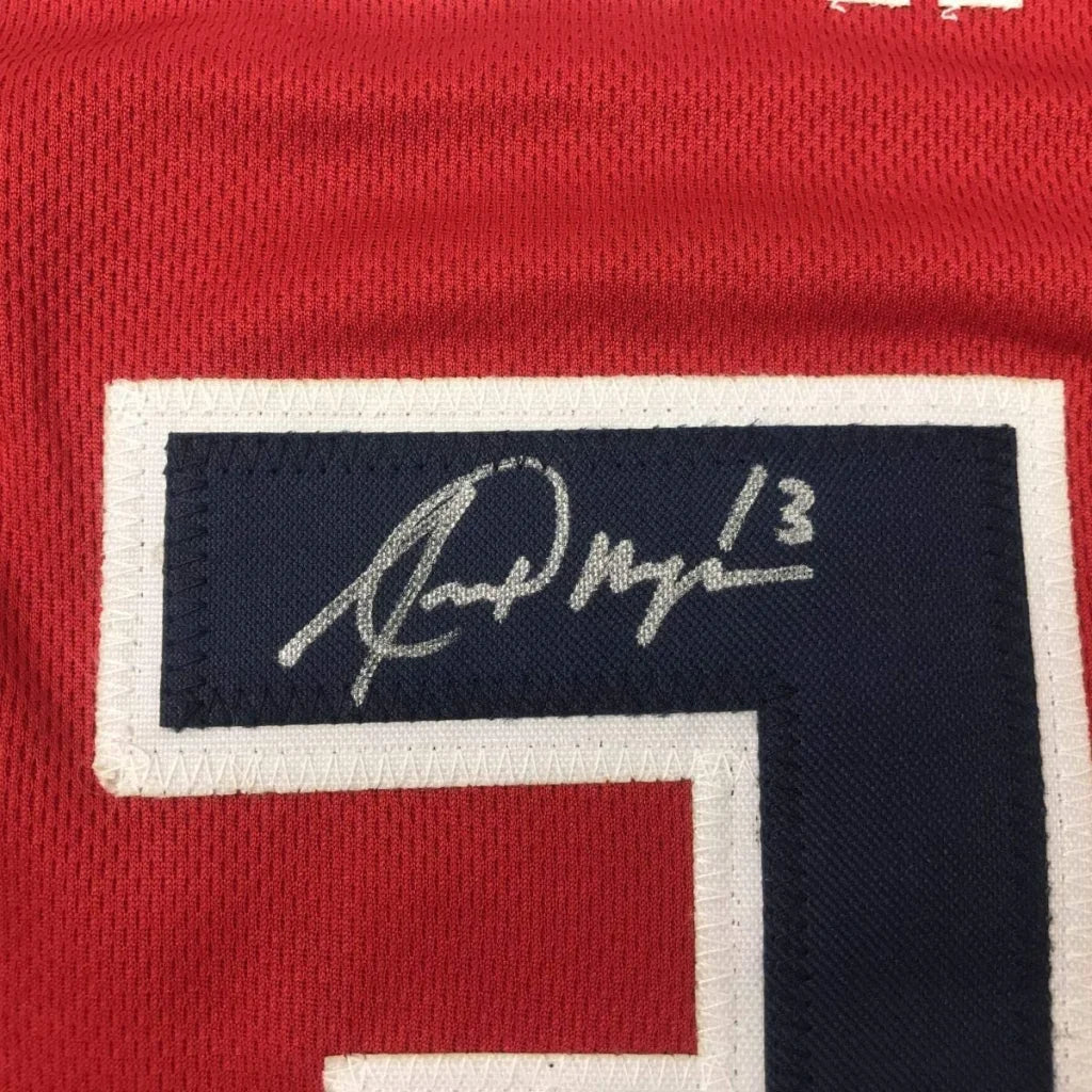 Autographed Alex Morgan red Team USA World Cup jersey with number 13