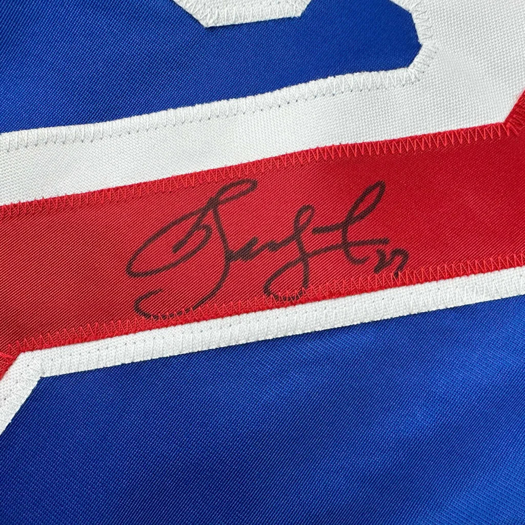 Autographed Alexei Kovalev New York Rangers custom jersey in red, white, and blue with black signature