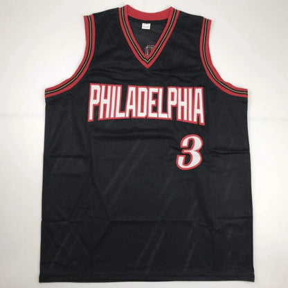 Black sleeveless custom jersey with red and white trim from professional sports league