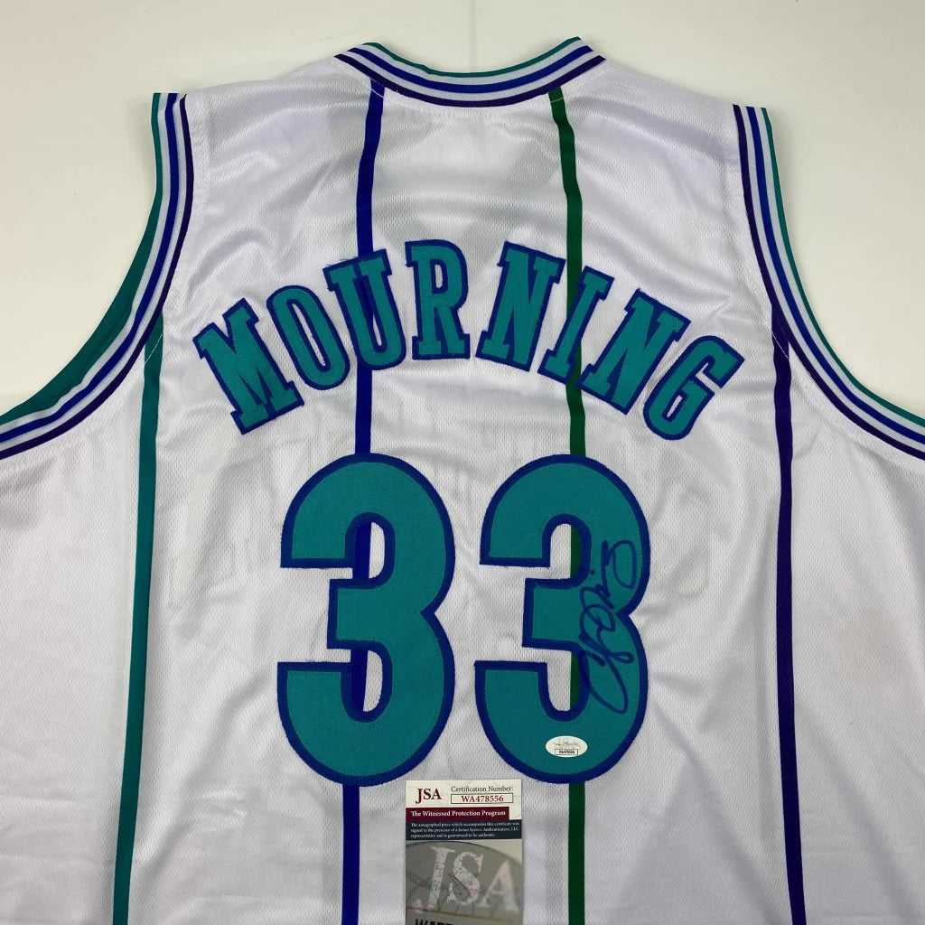 White Alonzo Mourning custom jersey from the Professional Sports League era with autograph and JSA sticker