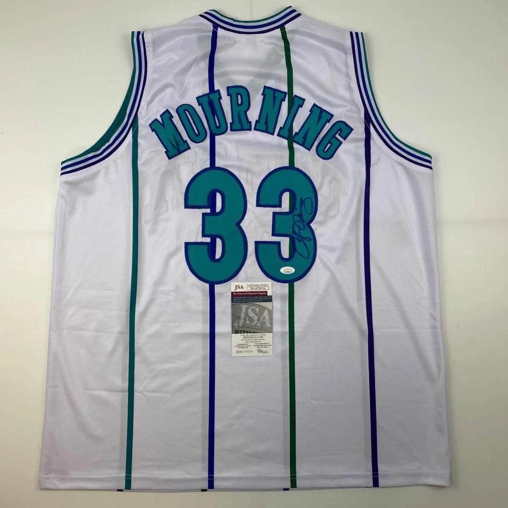 Autographed Alonzo Mourning Charlotte Hornets custom jersey from professional sports league era
