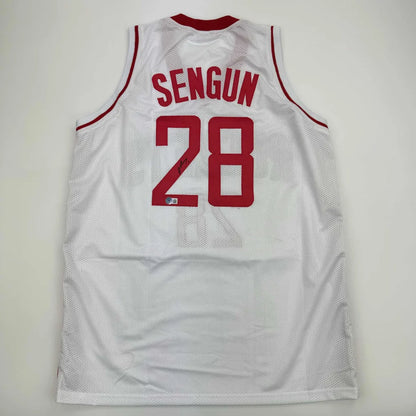 Alperen Sengun Houston White Jersey sports memorabilia with red trim and numbers