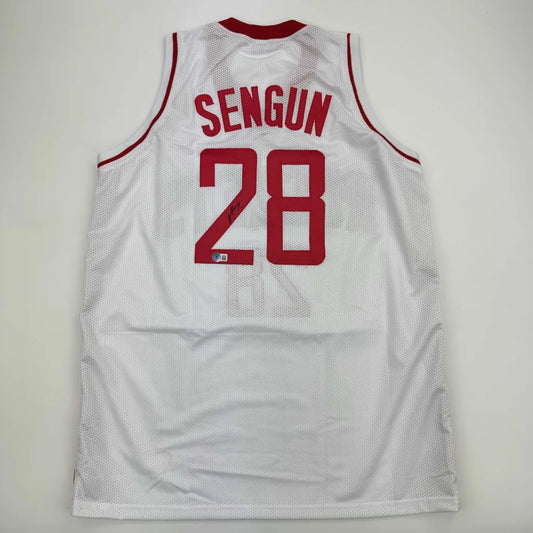 Alperen Sengun Houston White Jersey sports memorabilia with red trim and numbers