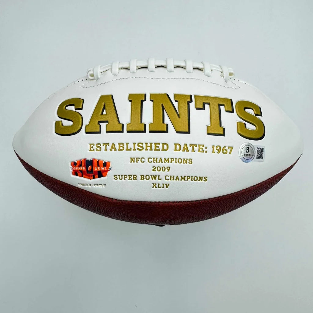 Autographed Alvin Kamara New Orleans Saints white panel football with gold Saints lettering commemorating 2009 NFC Championship and Super Bowl XLIV victory, Beckett BAS COA