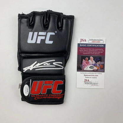 Black UFC MMA glove with white autograph and third party authentication certificate