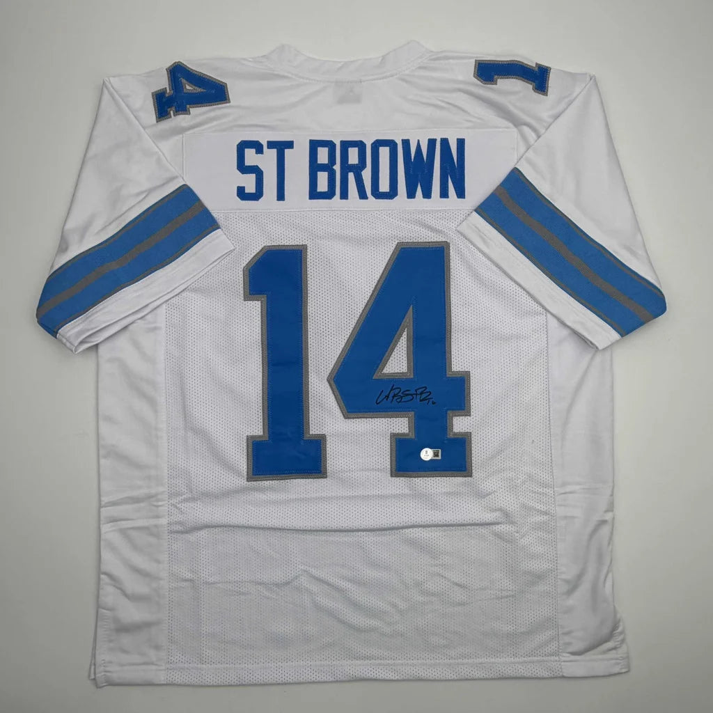 Autographed Amon-Ra St. Brown Detroit White Football Jersey Beckett BAS COA | Hall of Fame Sports Memorabilia | vintageantiquesgifts.com