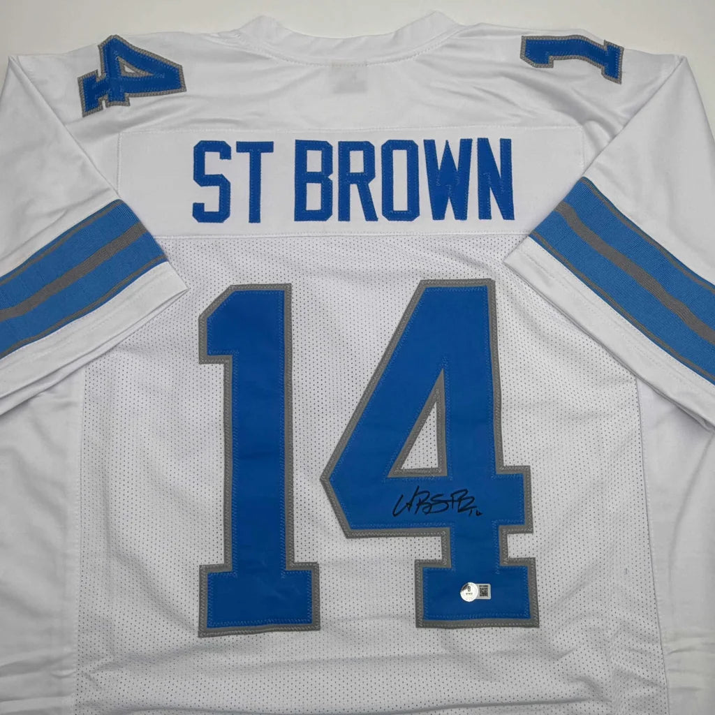 Autographed Amon-Ra St. Brown Detroit White Football Jersey Beckett BAS COA | Certified Authentic Signed Memorabilia | vintageantiquesgifts.com