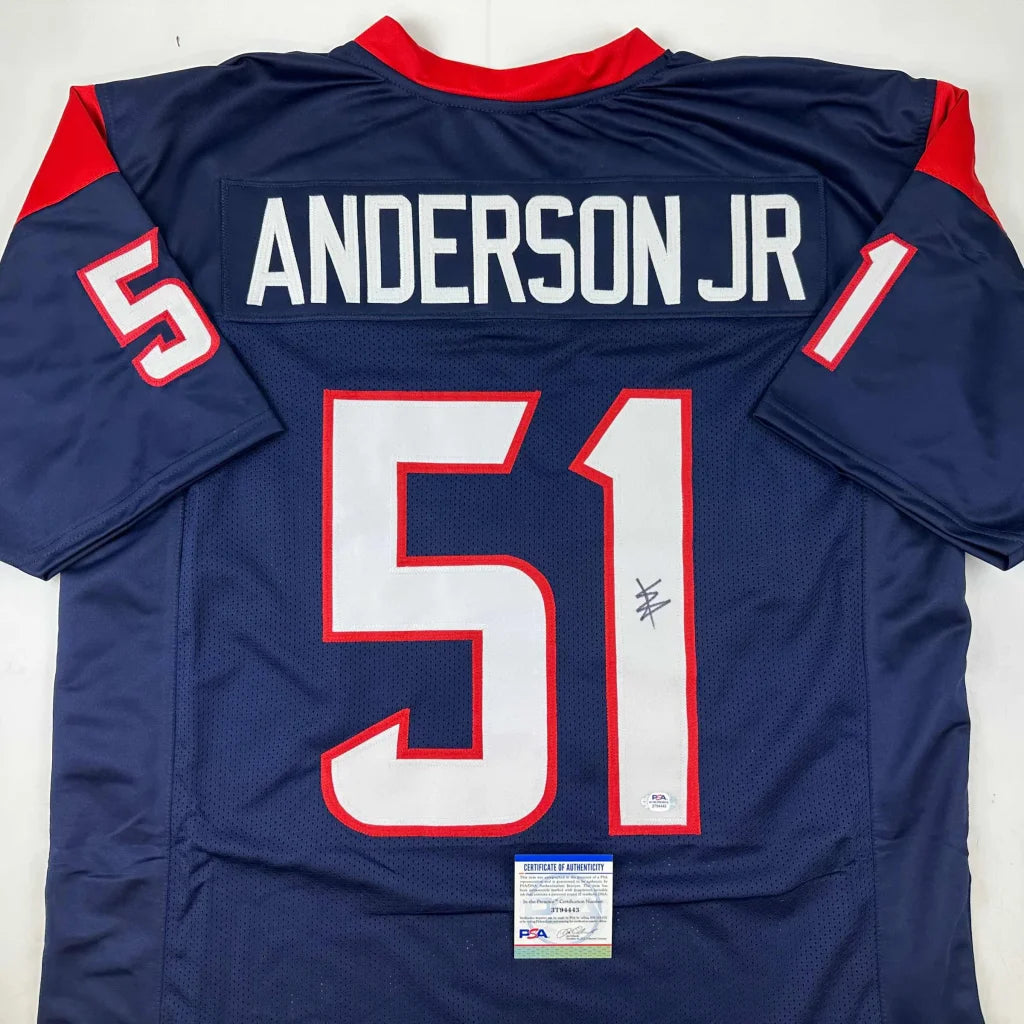 Back view of autographed navy blue and red houston texans custom jersey with white number 51 and name anderson jr. professional sports league collectible