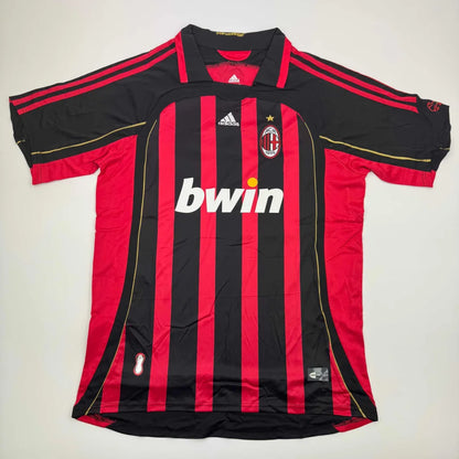 Red and black striped Adidas AC Milan soccer jersey for professional sports league fans