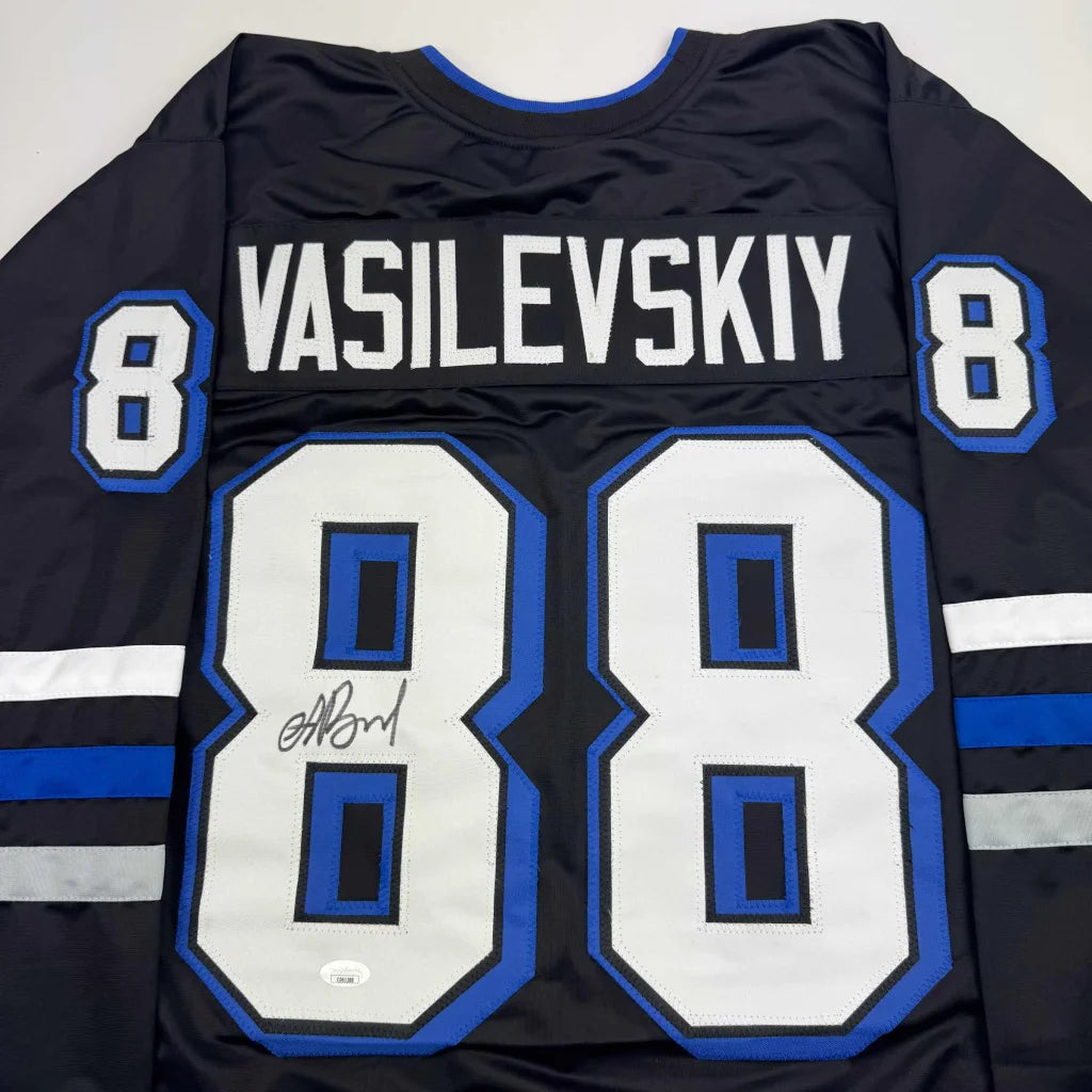 Signed black custom jersey with white and blue accents from a professional sports league