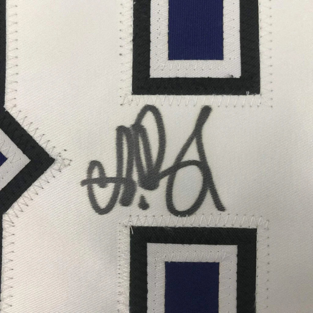 White fabric with stitched black and blue patches and a dark gray signature on Vasilevskiy 88 jersey