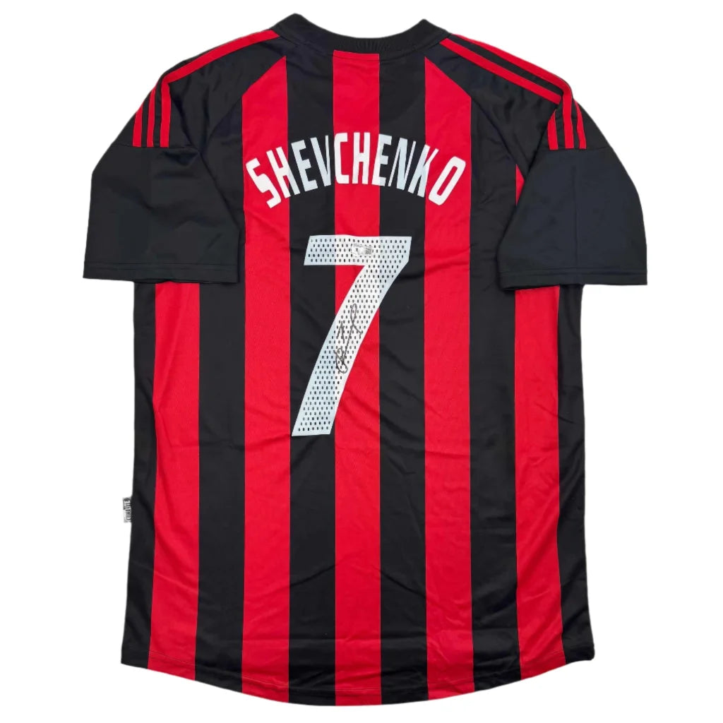 Back side of autographed andriy shevchenko ac milan red and black striped soccer jersey with white lettering and silver number 7