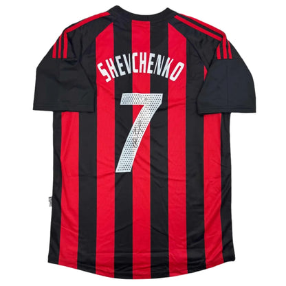 Back side of autographed andriy shevchenko ac milan red and black striped soccer jersey with white lettering and silver number 7