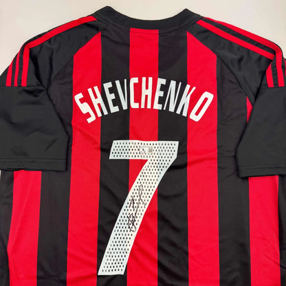 Back side of autographed andriy shevchenko ac milan red and black soccer jersey with perforated design and white nameplate