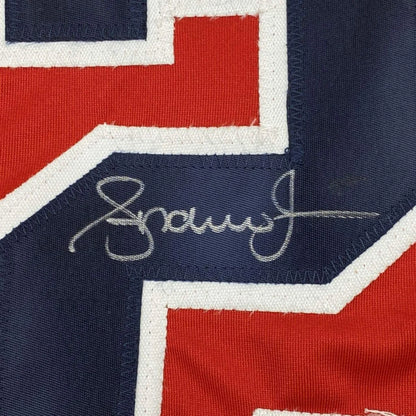 Autographed Andruw Jones Atlanta Braves custom jersey in navy blue, red, white with silver signature, PSA/DNA COA