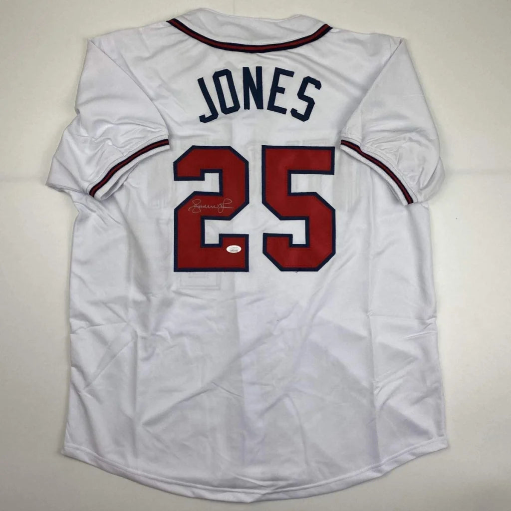 Autographed white custom jersey with JONES 25 for professional sports league fans