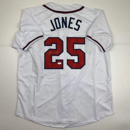 Autographed white custom jersey with JONES 25 for professional sports league fans