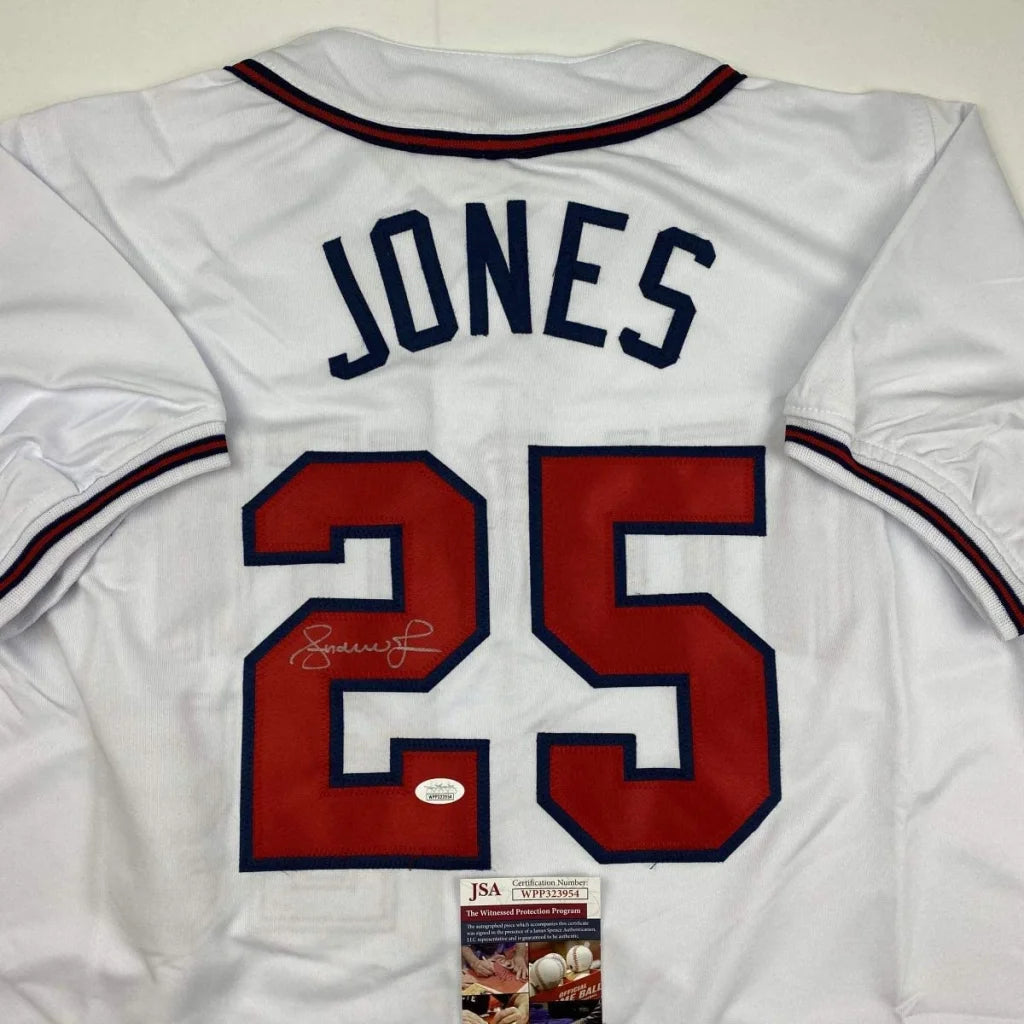 White custom jersey with JONES 25 autograph, perfect for professional sports fans