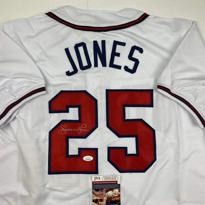 White custom jersey with JONES 25 autograph, perfect for professional sports fans