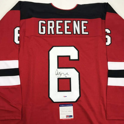Autographed red GREENE custom jersey from professional sports league with certificate of authenticity