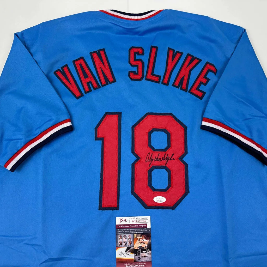 Autographed baby blue custom jersey with red numbers from a professional sports league