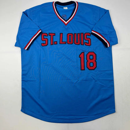 Blue short-sleeved custom jersey with red and white trim from Van Slyke signed professional sports collectible