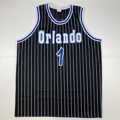 Black pinstriped Orlando basketball jersey with third party authentication and number 1