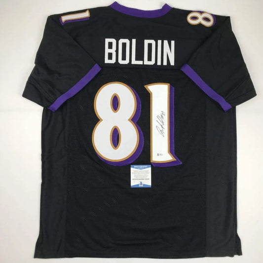 Back of a black custom jersey featuring white and purple number 81 and boldin name with autograph for professional sports league fans