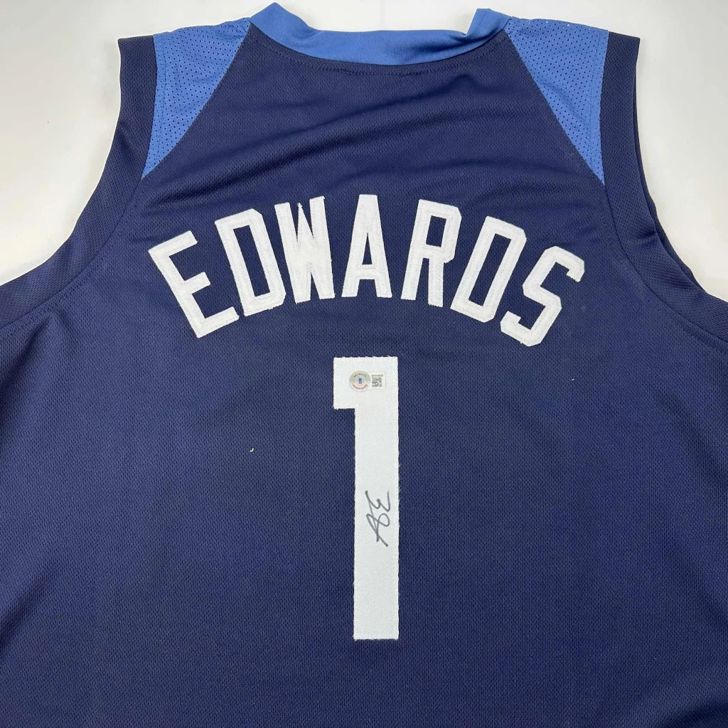 Navy blue autographed Anthony Edwards custom basketball jersey with white mesh shoulder panels for professional sports league fans