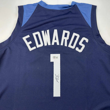 Navy blue autographed Anthony Edwards custom basketball jersey with white mesh shoulder panels for professional sports league fans