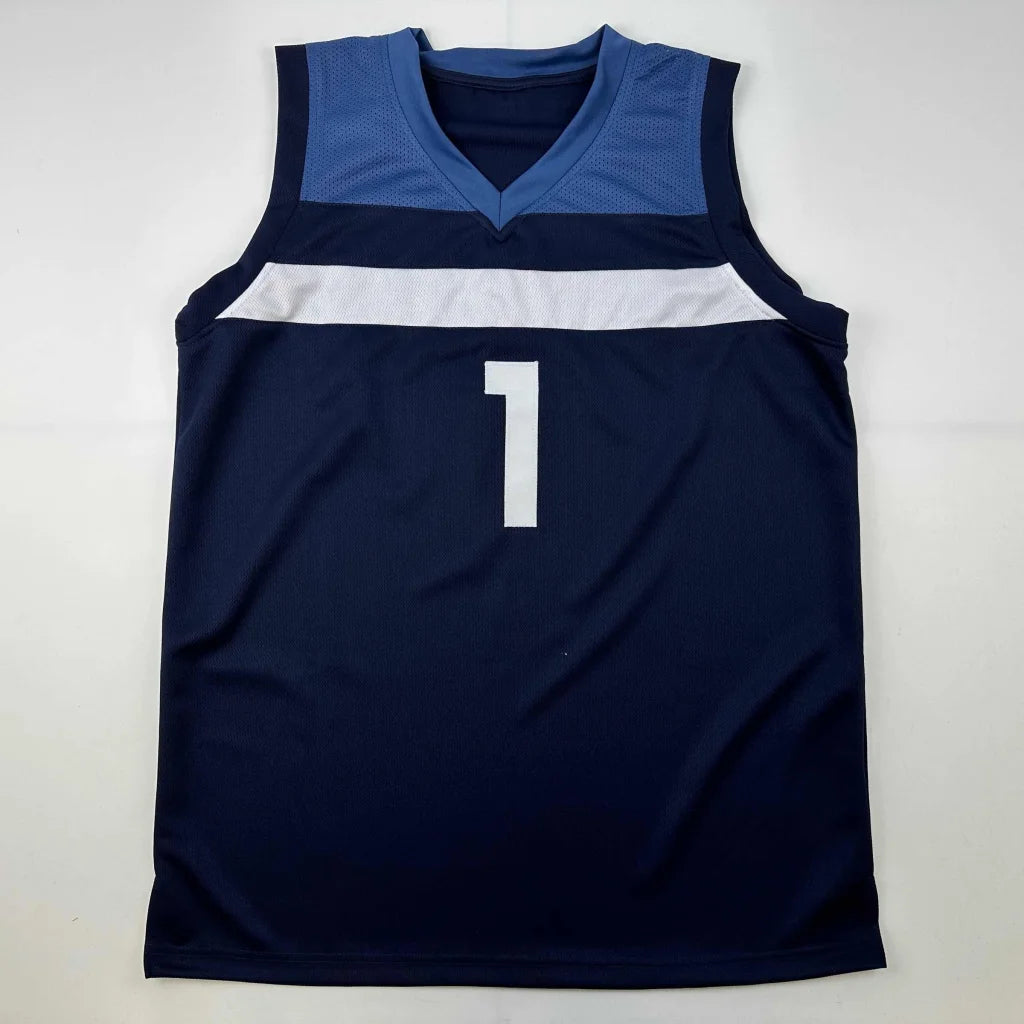 Navy blue sleeveless custom jersey with white stripe and number 1 signed by Anthony Edwards from professional sports league