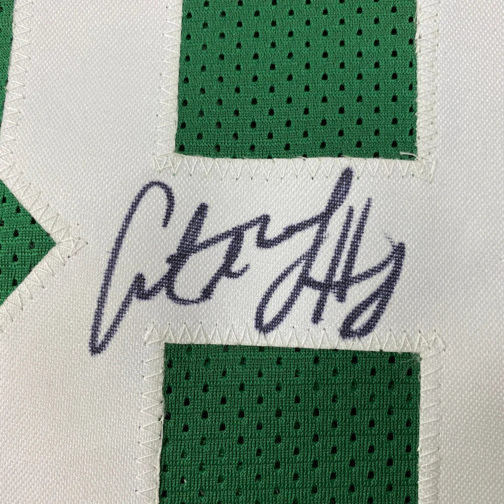 Green and white Kemba Walker custom jersey signed, perfect for professional sports fans
