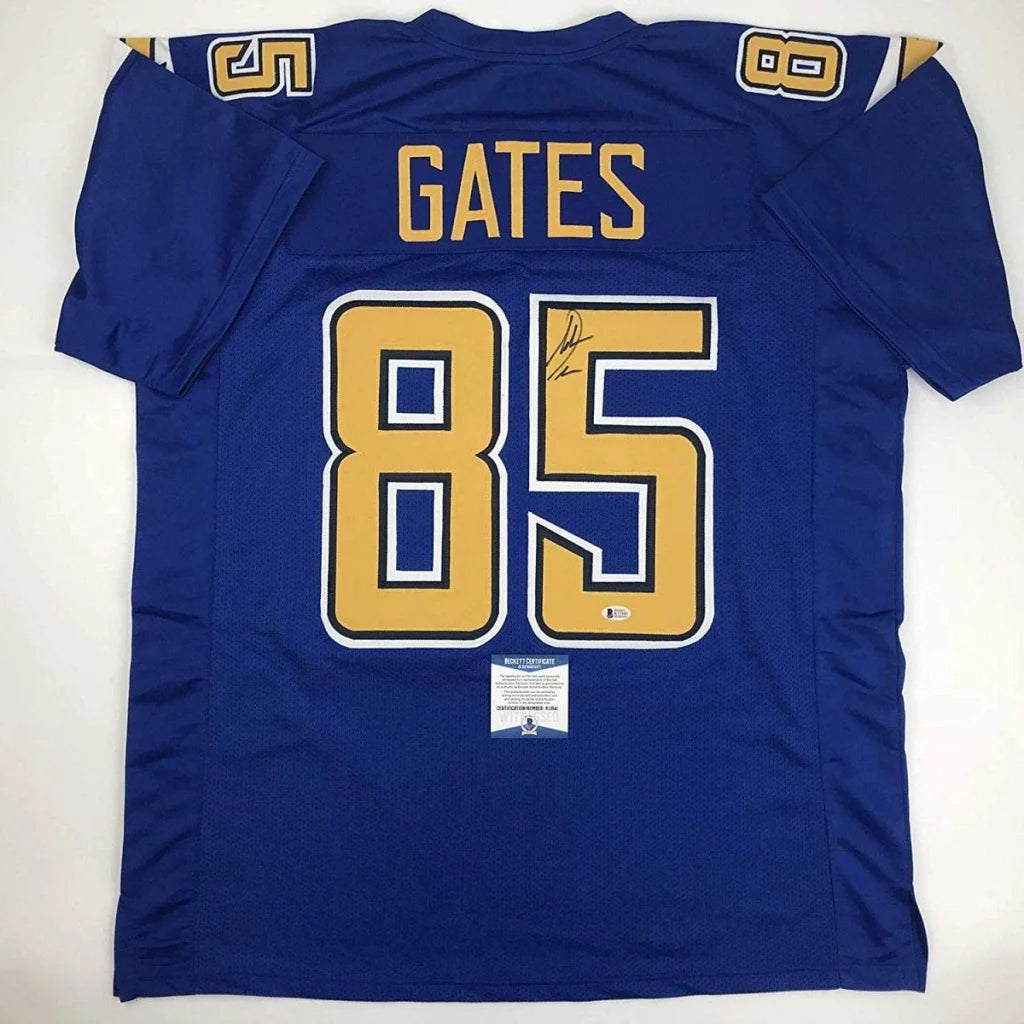 Blue custom jersey with gold numbers and autograph, perfect for professional sports fans