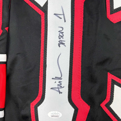 Autographed black and red chicago bulls jersey with white stripe featuring signature from friday the 13th actor ari lehman