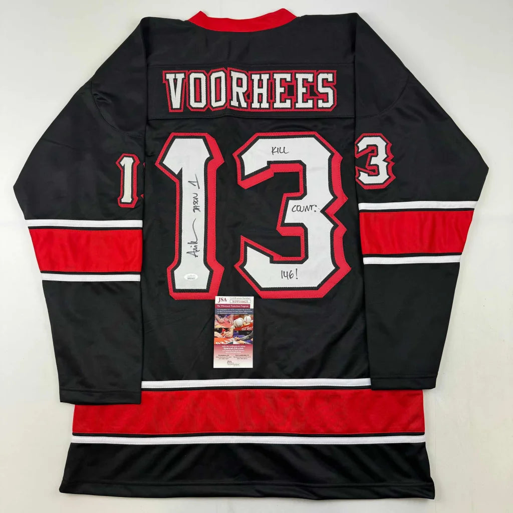 Back side of an autographed ari lehman jason voorhees friday the 13th black movie hockey jersey with number 13