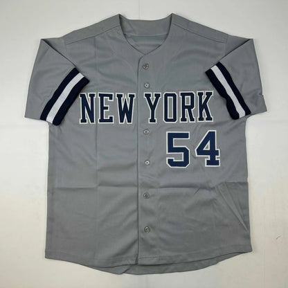 Gray custom jersey with navy and white stripes and NY 54 lettering for professional sports fans