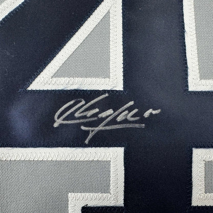 Autographed navy blue custom jersey from a professional sports league collectible