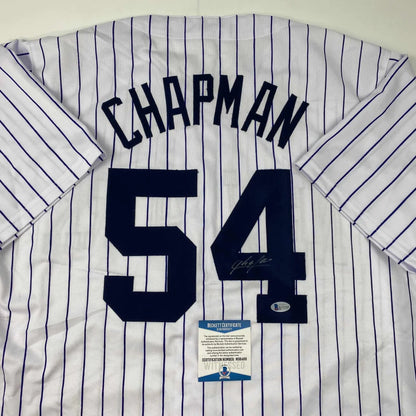 Autographed Aroldis Chapman New York Pinstripe Baseball Jersey Beckett BAS COA | Certified Authentic Signed Memorabilia | vintageantiquesgifts.com