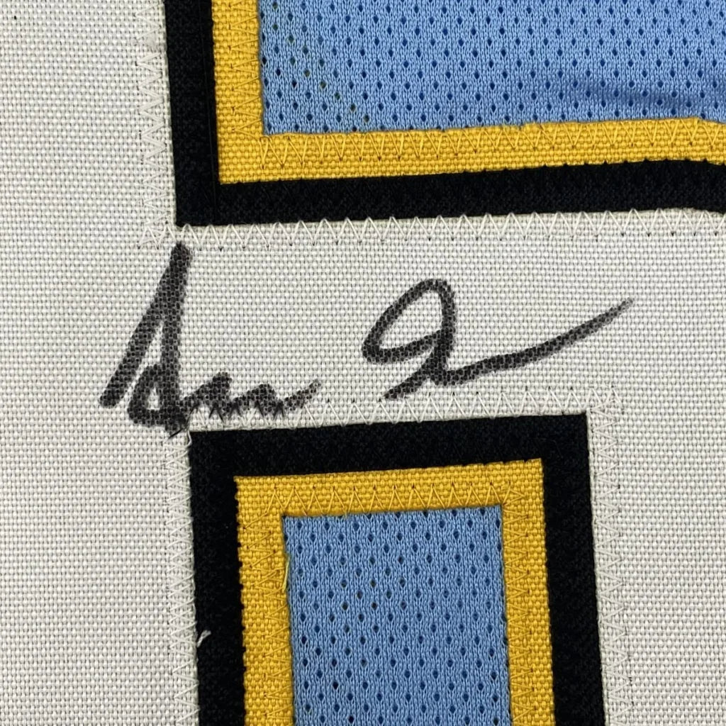 Autographed SAMUEL JR custom jersey with light blue yellow black accents for professional sports league