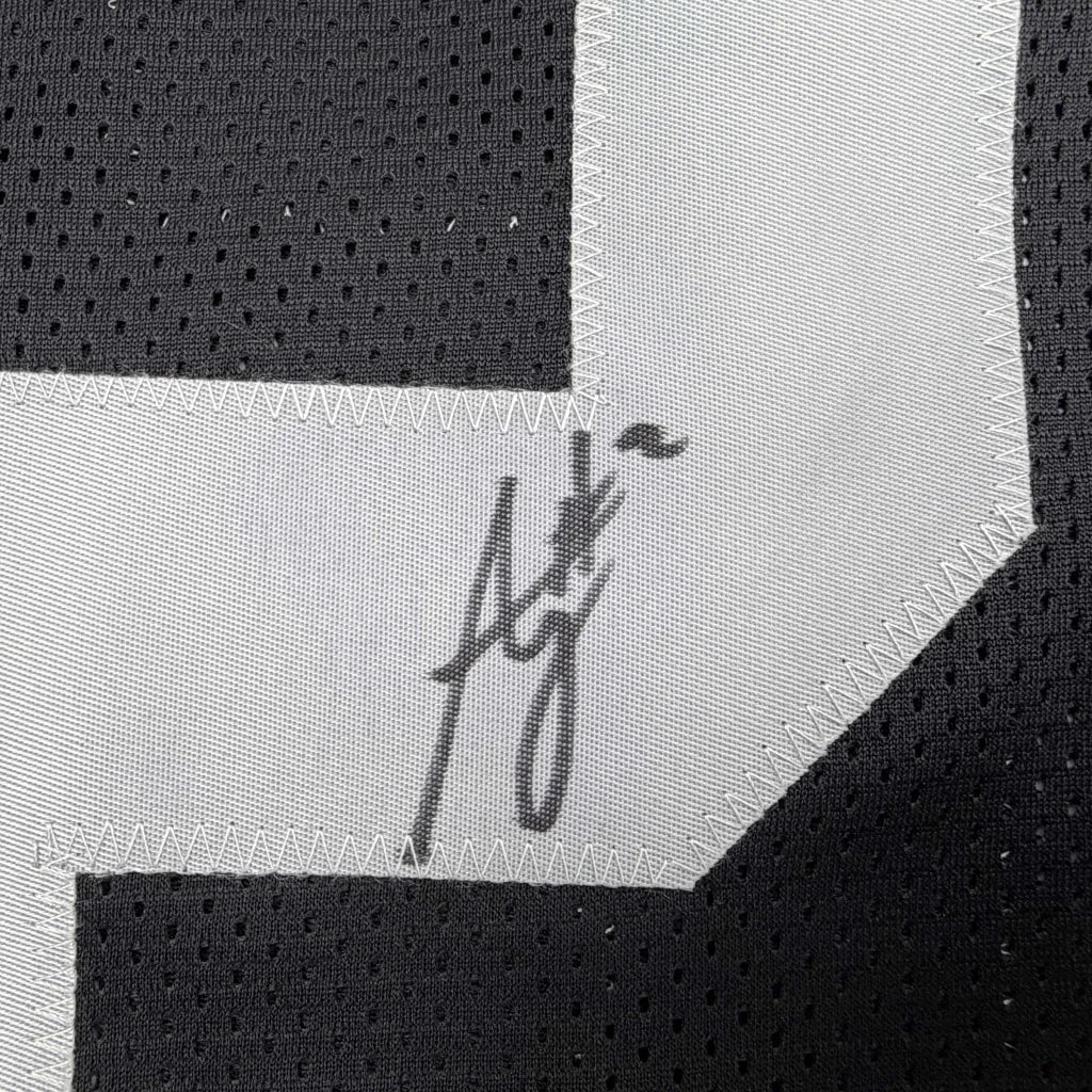 Autographed Ashton Jeanty black custom jersey in professional sports league
