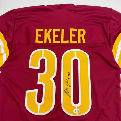 Autographed Austin Ekeler Washington Burgundy Football Jersey Beckett BAS COA | Certified Authentic Signed Memorabilia | vintageantiquesgifts.com